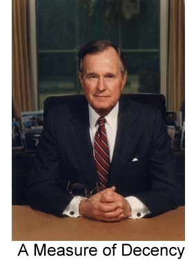 President HW Bush sitting at desk in Oval Office